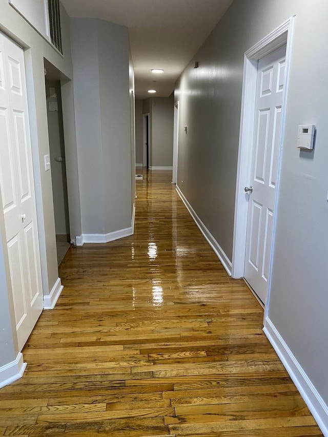 501 W 60th Pl Unit 3, Chicago, IL 60621 - hallway featuring hardwood / wood-style floors and baseboards
