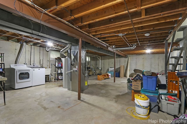 1428 Juneway Ter, Round Lake Beach, IL 60073 - unfinished below grade area with washing machine and clothes dryer, a sink, and heating unit