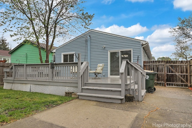 1428 Juneway Ter, Round Lake Beach, IL 60073 - rear view of property featuring a wooden deck