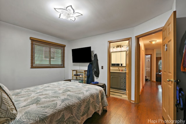 1428 Juneway Ter, Round Lake Beach, IL 60073 - bedroom with dark wood-style flooring