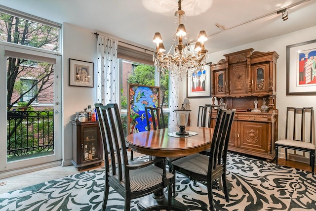 26 E 14th Pl, Chicago, IL 60605 - dining room with a chandelier and healthy amount of natural light