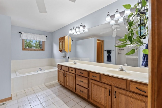 730 N Hundley St, Hoffman Estates, IL 60169 - bathroom with ceiling fan, double vanity, a bath, and tile patterned flooring