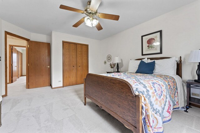 730 N Hundley St, Hoffman Estates, IL 60169 - bedroom with light colored carpet, a closet, and ceiling fan