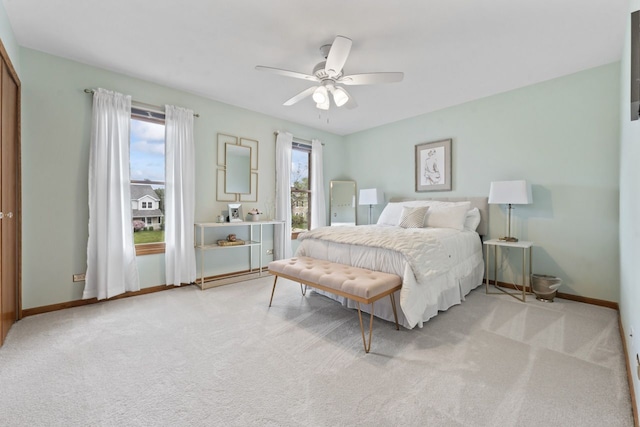 730 N Hundley St, Hoffman Estates, IL 60169 - bedroom featuring light colored carpet, baseboards, and ceiling fan