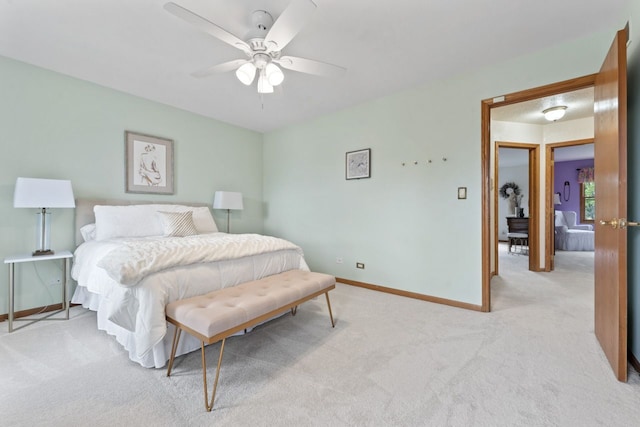 730 N Hundley St, Hoffman Estates, IL 60169 - bedroom with light colored carpet, baseboards, and a ceiling fan
