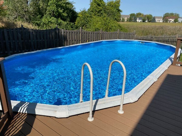 730 N Hundley St, Hoffman Estates, IL 60169 - view of swimming pool featuring a fenced backyard and a deck