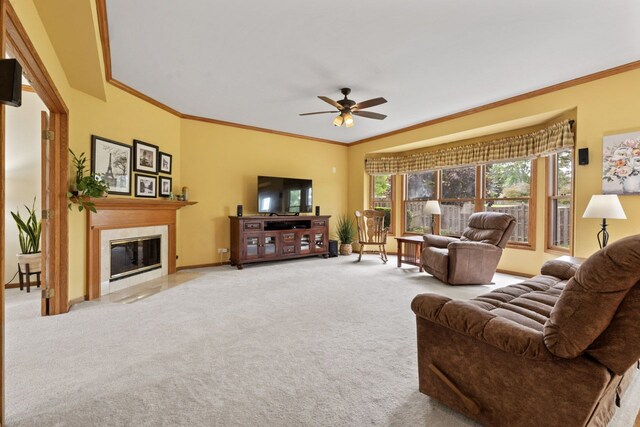 730 N Hundley St, Hoffman Estates, IL 60169 - living room featuring carpet flooring, crown molding, a ceiling fan, a high end fireplace, and baseboards