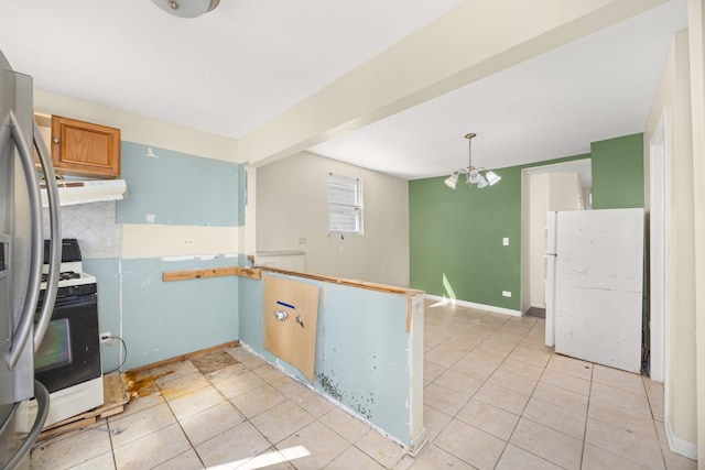 1661 Euclid Ave, Chicago Heights, IL 60411 - kitchen featuring white appliances, a peninsula, light tile patterned floors, and under cabinet range hood