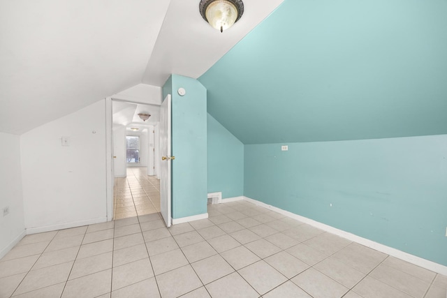 1661 Euclid Ave, Chicago Heights, IL 60411 - bonus room with light tile patterned floors, lofted ceiling, and baseboards