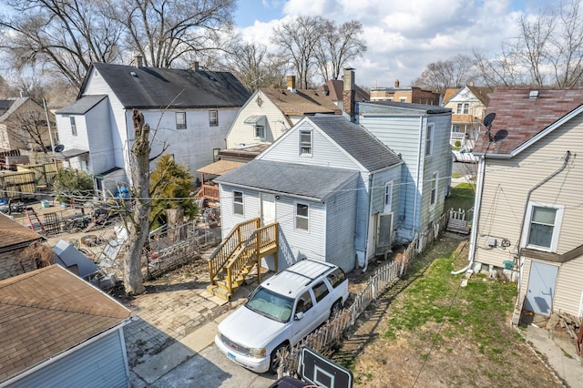 1661 Euclid Ave, Chicago Heights, IL 60411 - rear view of property featuring a shingled roof and a residential view