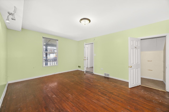1661 Euclid Ave, Chicago Heights, IL 60411 - unfurnished bedroom featuring hardwood / wood-style flooring and baseboards