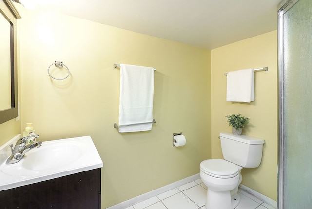 612 Aurora Way, Wheaton, IL 60187 - bathroom featuring vanity, tile patterned flooring, and a shower with door