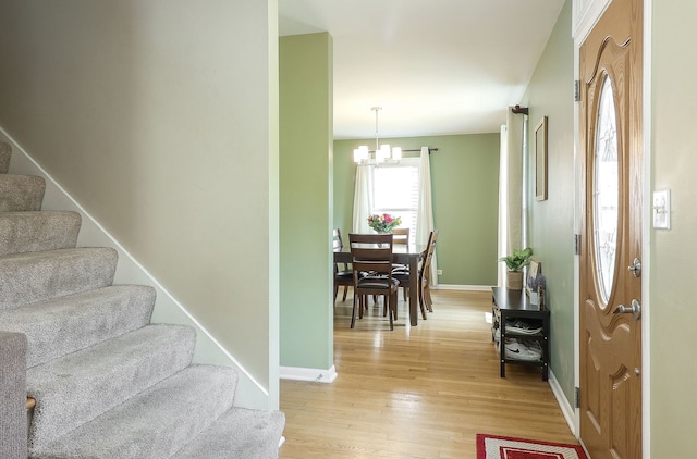 612 Aurora Way, Wheaton, IL 60187 - entryway featuring a chandelier, stairway, and light wood-style floors