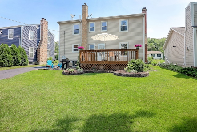 612 Aurora Way, Wheaton, IL 60187 - back of house featuring a deck, a yard, and a chimney