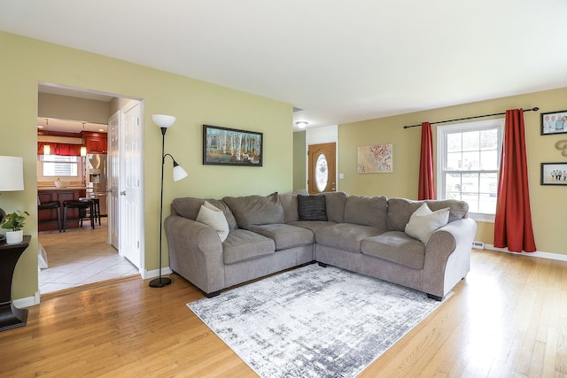 612 Aurora Way, Wheaton, IL 60187 - living room featuring light wood-style flooring and baseboards