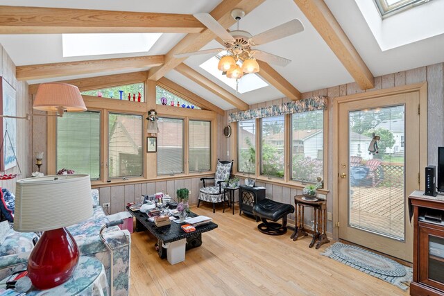 16 W Monroe St, Villa Park, IL 60181 - sunroom with a skylight, wooden walls, wood finished floors, and a deck