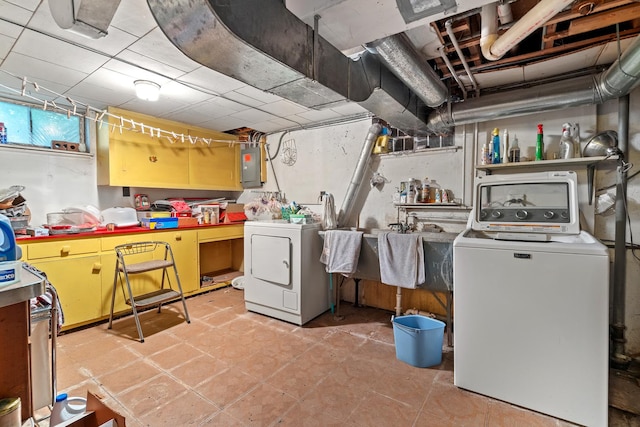 16 W Monroe St, Villa Park, IL 60181 - basement featuring washing machine and clothes dryer, electric panel, and light tile patterned floors