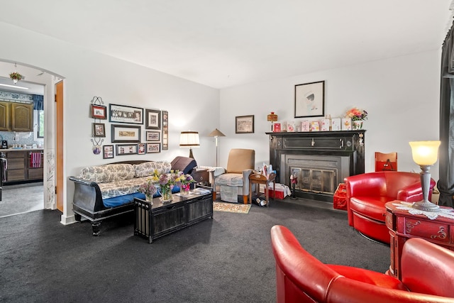 16 W Monroe St, Villa Park, IL 60181 - living room featuring a fireplace with flush hearth and arched walkways