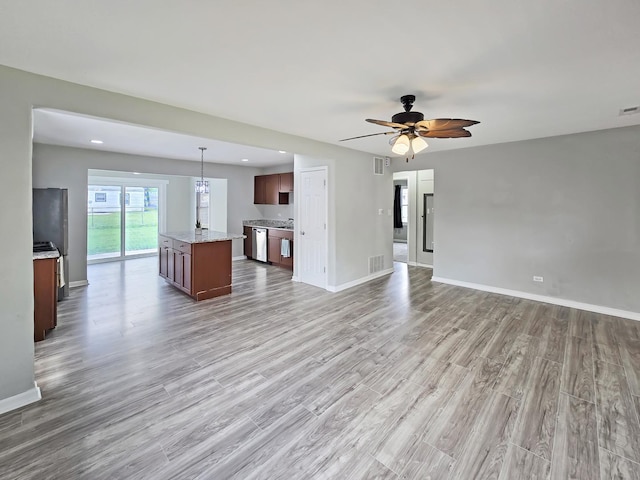 110 Louis Rd, Joliet, IL 60433 - unfurnished living room with wood finished floors, ceiling fan, baseboards, and recessed lighting