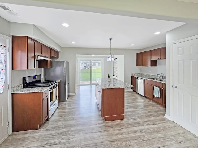 110 Louis Rd, Joliet, IL 60433 - kitchen with stainless steel appliances, a sink, light wood-style flooring, under cabinet range hood, and recessed lighting