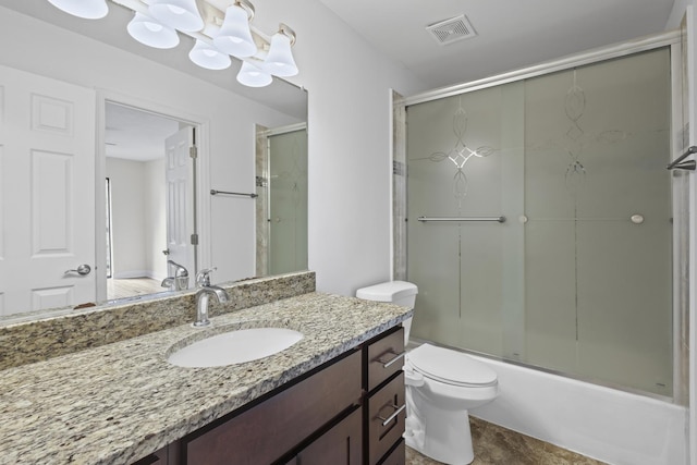 3S261 Briarwood Dr, Warrenville, IL 60555 - bathroom featuring vanity, toilet, and combined bath / shower with glass door
