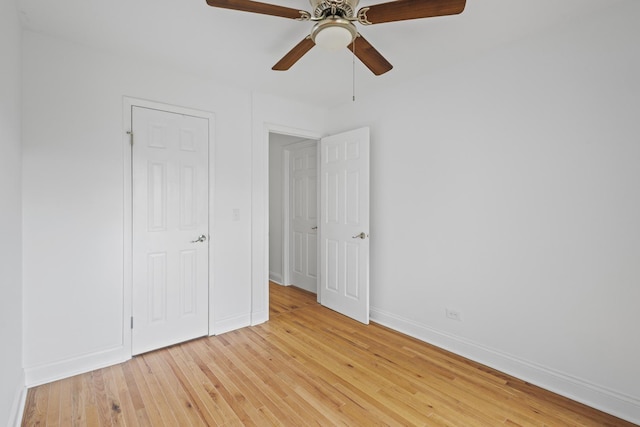 3S261 Briarwood Dr, Warrenville, IL 60555 - unfurnished bedroom with light wood finished floors, baseboards, and ceiling fan