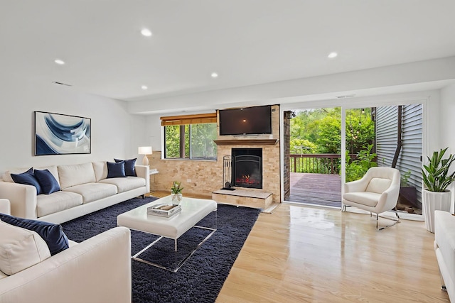 3S261 Briarwood Dr, Warrenville, IL 60555 - living area with light wood-style floors, recessed lighting, and a fireplace