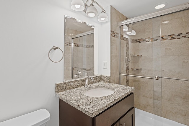 3S261 Briarwood Dr, Warrenville, IL 60555 - bathroom featuring toilet, vanity, and a stall shower