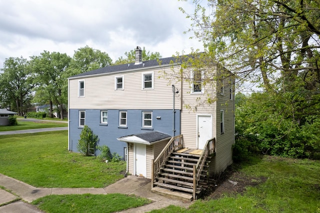 17231 Laflin Ave, East Hazel Crest, IL 60429 - back of house with a lawn and a chimney