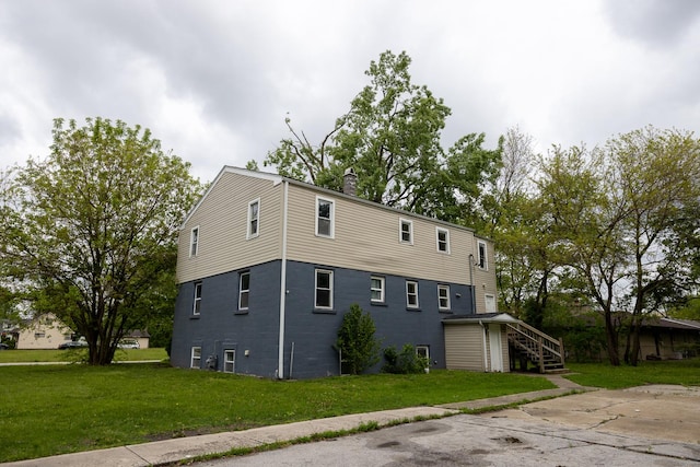 17231 Laflin Ave, East Hazel Crest, IL 60429 - view of side of property featuring stairway, a yard, and a chimney