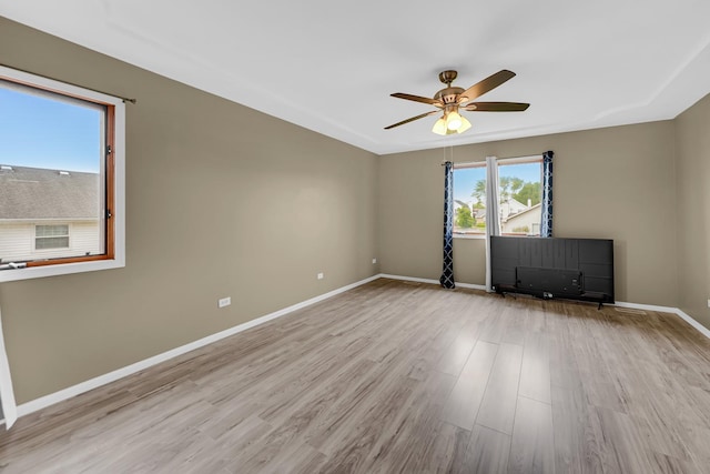 4311 187th St, Country Club Hills, IL 60478 - unfurnished room featuring ceiling fan, wood finished floors, and baseboards