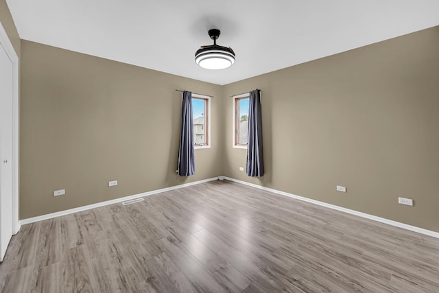 4311 187th St, Country Club Hills, IL 60478 - unfurnished room with light wood-type flooring and baseboards