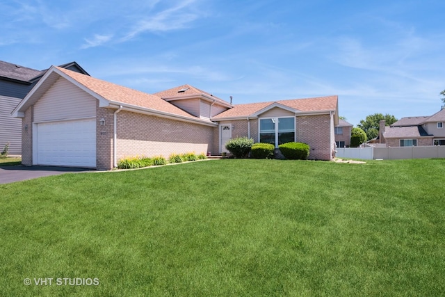 18133 Brittany Ln, Lansing, IL 60438 - ranch-style home featuring brick siding, a garage, asphalt driveway, and a shingled roof