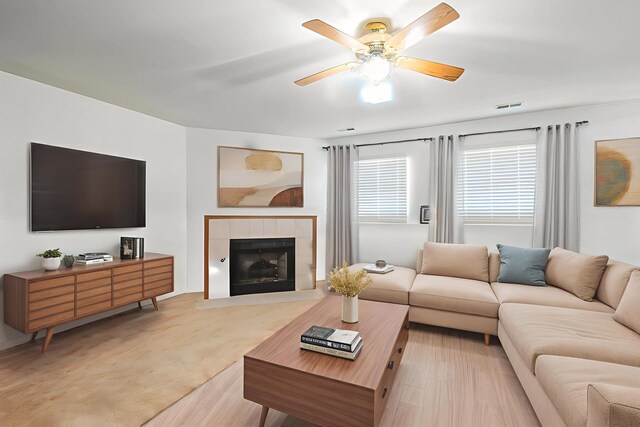 18133 Brittany Ln, Lansing, IL 60438 - living area with ceiling fan and a tile fireplace