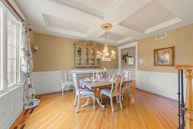 10423 Capistrano Ln, Orland Park, IL 60467 - dining room with healthy amount of natural light, coffered ceiling, light wood finished floors, a decorative wall, and beam ceiling