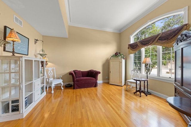10423 Capistrano Ln, Orland Park, IL 60467 - sitting room with wood finished floors and ornamental molding