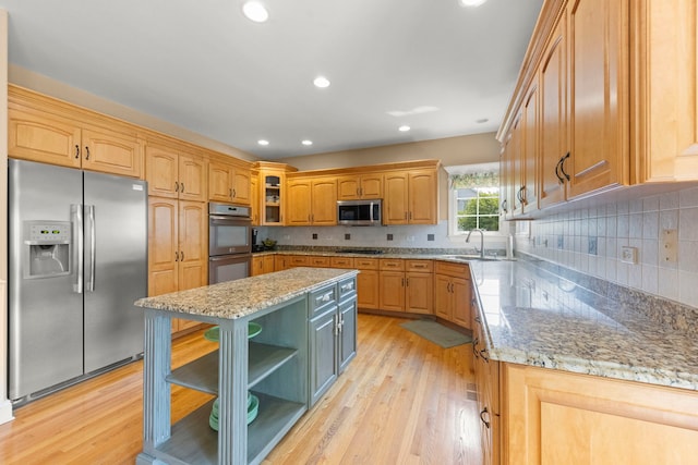 10423 Capistrano Ln, Orland Park, IL 60467 - kitchen with stainless steel appliances, open shelves, light stone countertops, a kitchen island, and recessed lighting