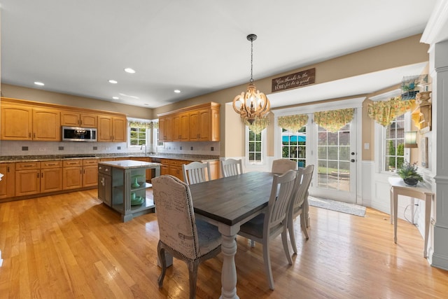 10423 Capistrano Ln, Orland Park, IL 60467 - dining area with a chandelier, light wood-style floors, recessed lighting, and a wainscoted wall