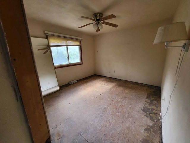 4502 NW Scenic Dr, Peoria, IL 61615 - unfurnished bedroom with ceiling fan