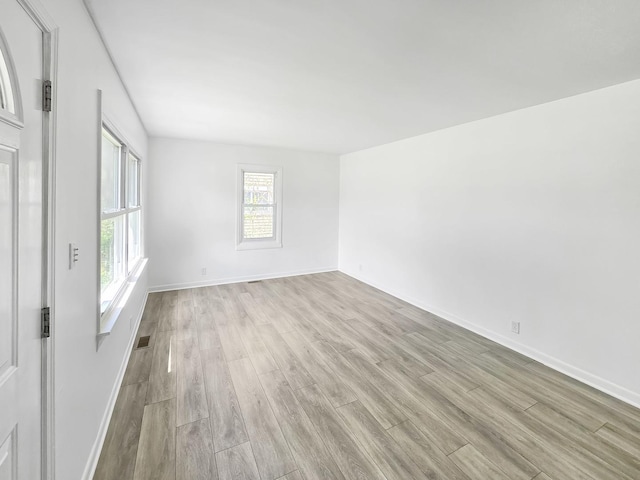 511 E Stimmel St, West Chicago, IL 60185 - spare room with light wood-style floors and baseboards
