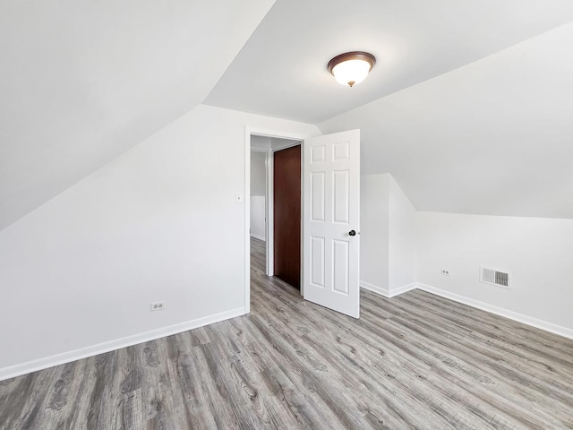 511 E Stimmel St, West Chicago, IL 60185 - bonus room with wood finished floors, vaulted ceiling, and baseboards