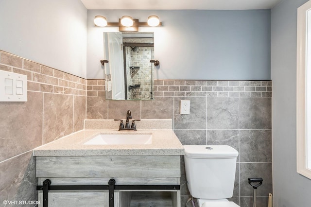 10624 S Ave H Rd, Chicago, IL 60617 - bathroom featuring vanity, toilet, and tile walls