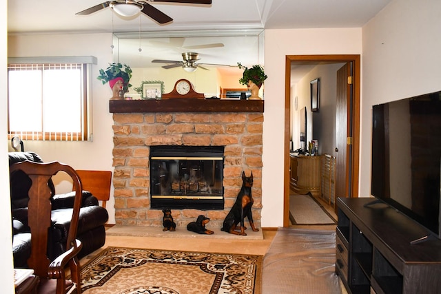 17429 W Chestnut Ln, Gurnee, IL 60031 - living area featuring a ceiling fan, a glass covered fireplace, crown molding, and wood finished floors