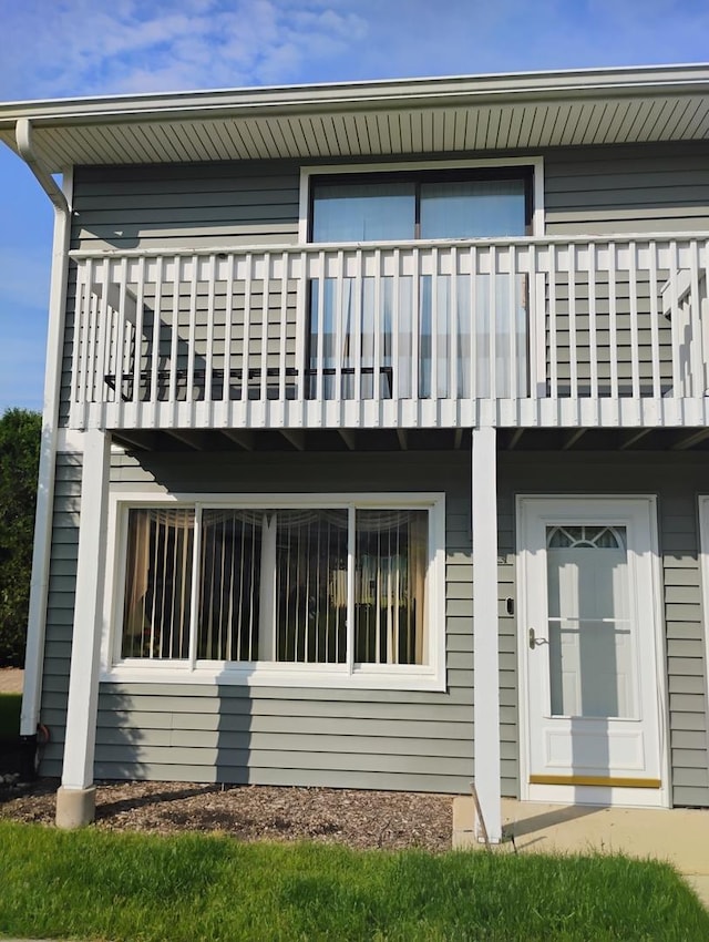 17429 W Chestnut Ln, Gurnee, IL 60031 - rear view of property with a balcony