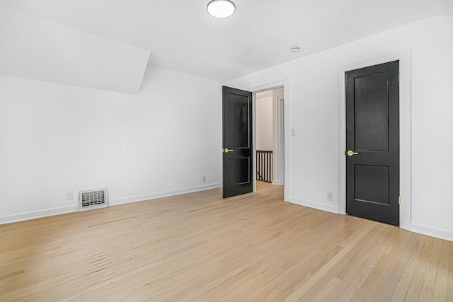 9602 S Troy Ave, Evergreen Park, IL 60805 - unfurnished bedroom featuring light wood-style floors and baseboards