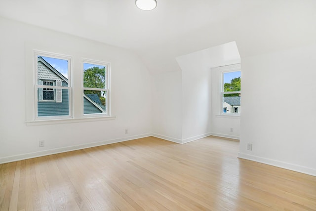 9602 S Troy Ave, Evergreen Park, IL 60805 - bonus room featuring vaulted ceiling, light wood-style floors, plenty of natural light, and baseboards