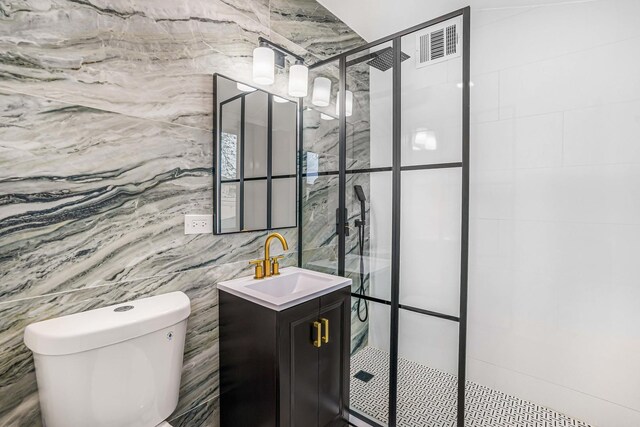 9602 S Troy Ave, Evergreen Park, IL 60805 - full bath featuring vanity, toilet, a stall shower, and tile walls