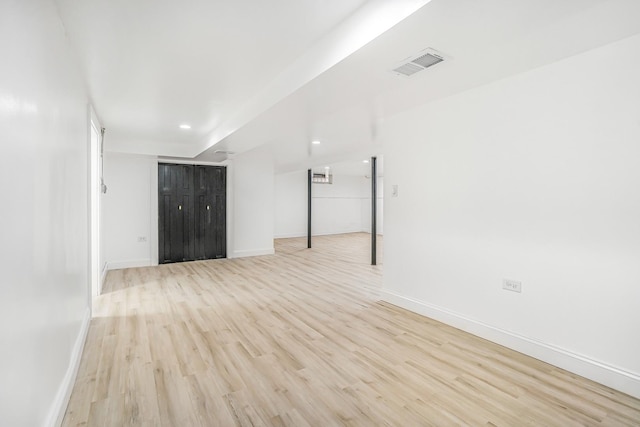 9602 S Troy Ave, Evergreen Park, IL 60805 - unfurnished room featuring light wood-style flooring, baseboards, and recessed lighting