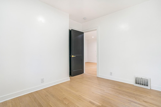 9602 S Troy Ave, Evergreen Park, IL 60805 - unfurnished room featuring light wood-type flooring and baseboards