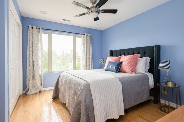 210 Des Plaines Ave Unit B, Forest Park, IL 60130 - bedroom featuring wood finished floors, baseboards, and ceiling fan